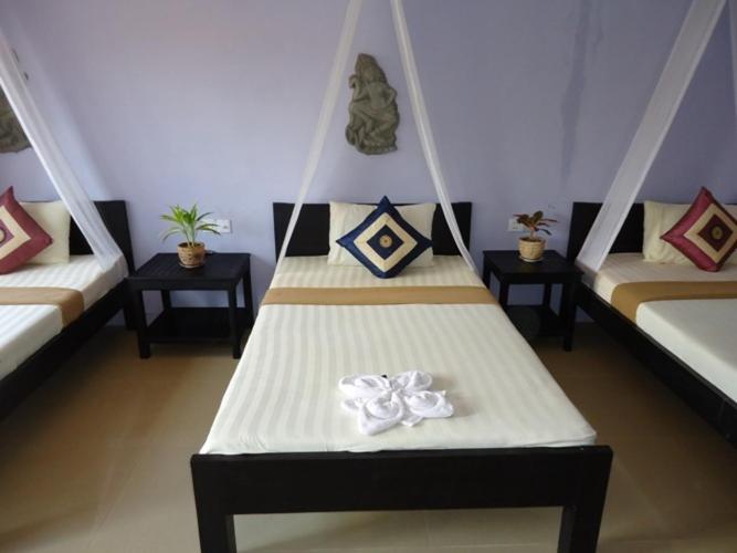 Ladybug Guesthouse Siem Reap Kamer foto